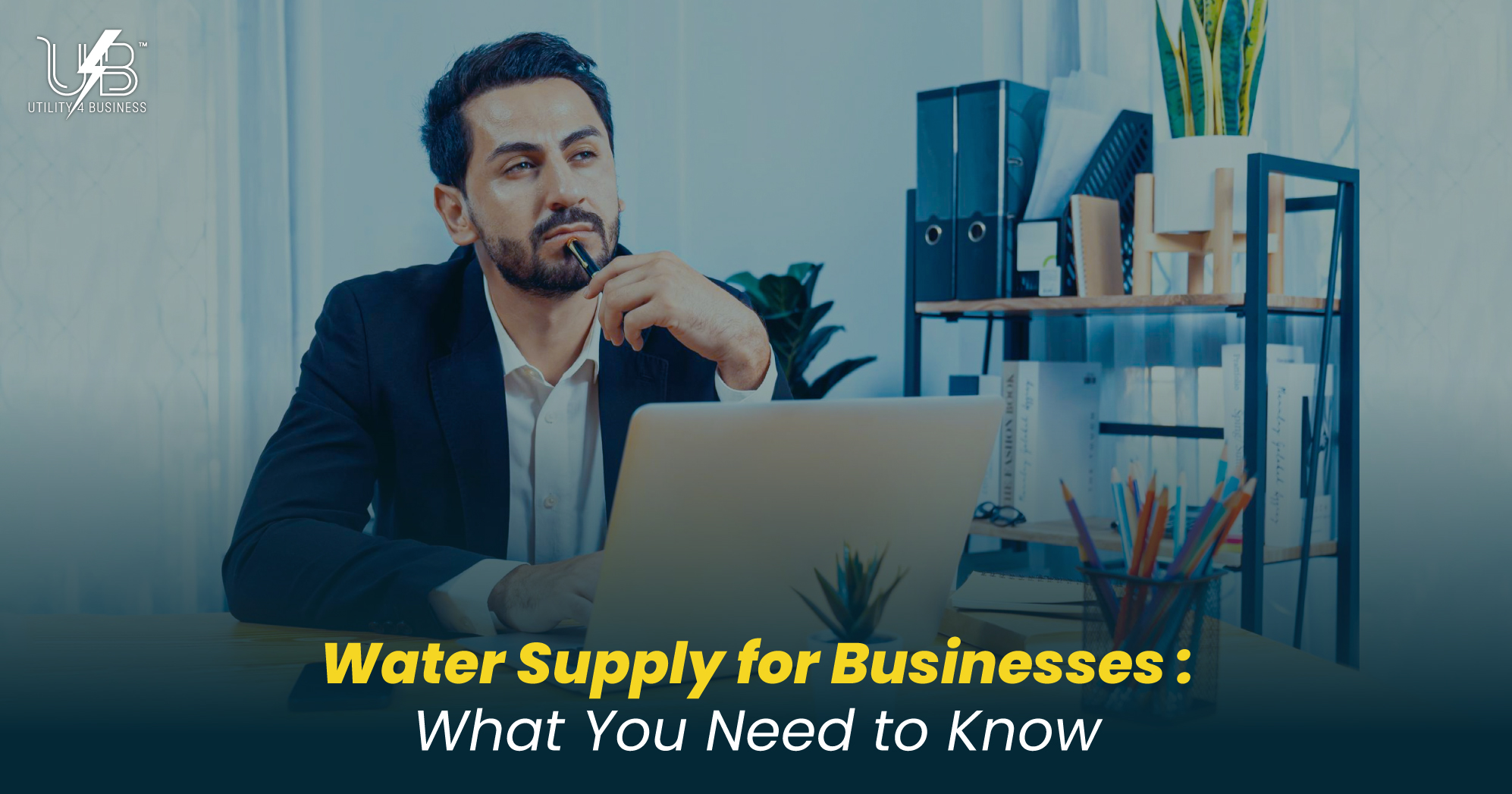 Water supply for businesses guide, business owner planning water management and compliance at office desk, Utility4Business solutions.